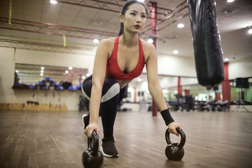 women use kettlebells